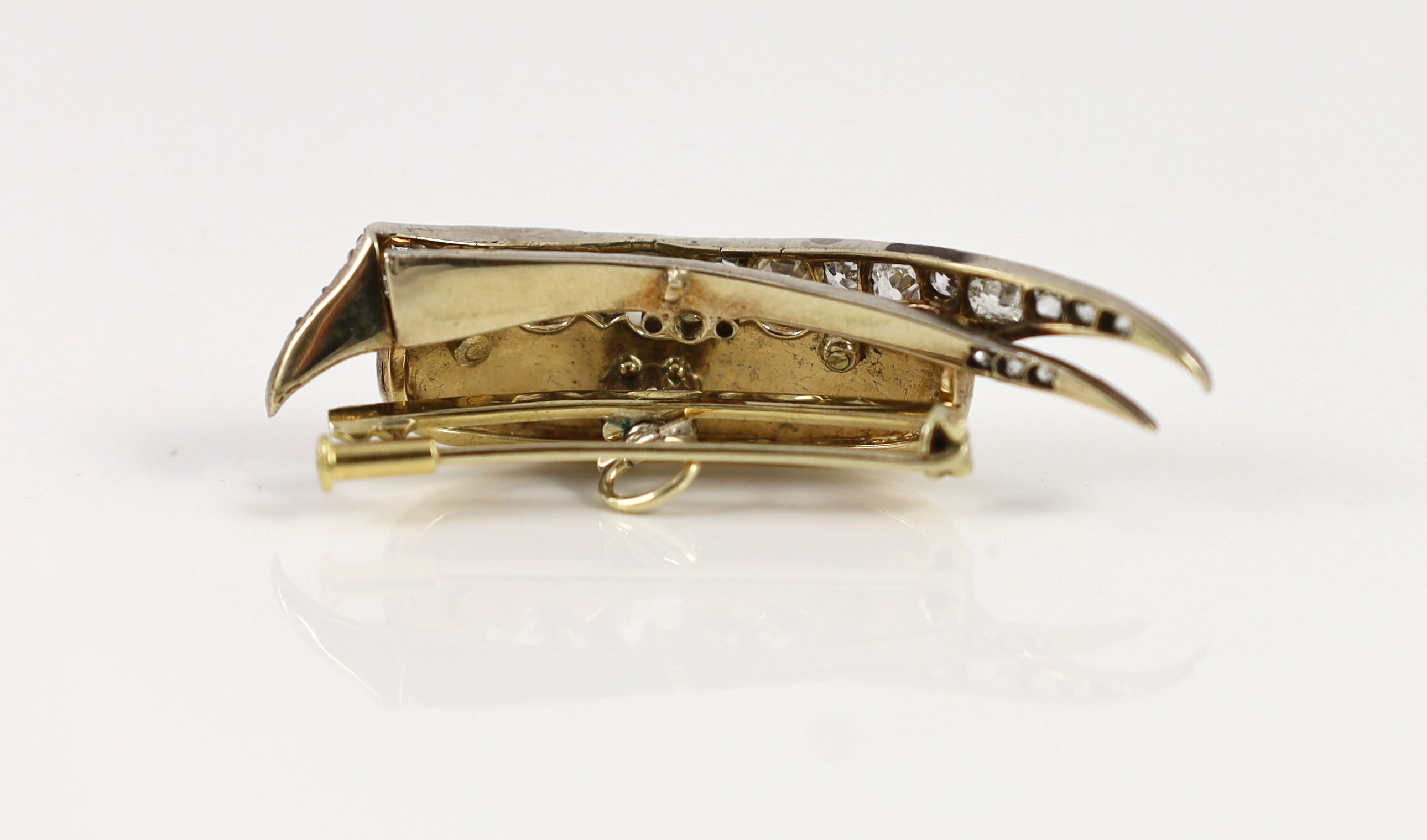 A Victorian gold and silver, diamond and split pearl set brooch, modelled as a 'chapeau gules turned up ermine' or heraldic cap of maintenance
